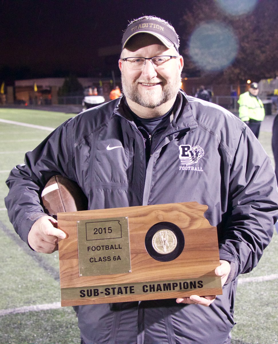 BVTouchdownclub's tweet photo. Holding History...@CoachDriskell with the 1st EKL and Blue Valley 6A Trophy in history! https://t.co/3Pp8dyjye5