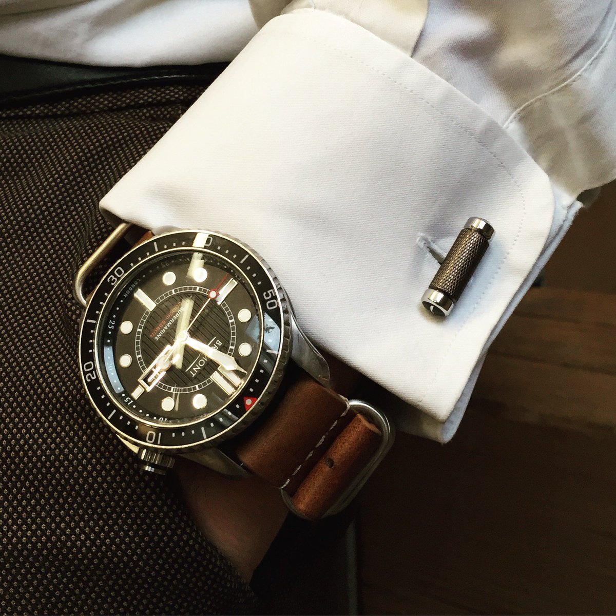 Bremont's tweet photo. #MyBremont of the new #Bremont T-Bar Cufflinks pictured with the Bremont Supermarine S2000 https://t.co/soh08YGFwi https://t.co/2d8OHSJroG