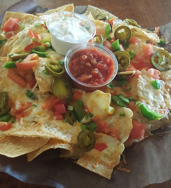 pub101_ottawa's tweet photo. What has cheese, peppers, green onion & is delish all over? $5.01 #nachos, that's what! #Pub10Fun #OttawaEats#NomNom https://t.co/FoSGgoN6QX