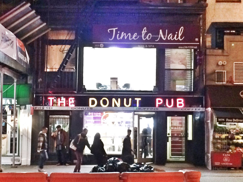 bobmartin9000's tweet photo. Okay. "The Donut Pub": it's disgusting, but it's honest. Beer and donuts. But "Time to Nail"? #isthatapun? #nyc https://t.co/xXEhtLHsoD