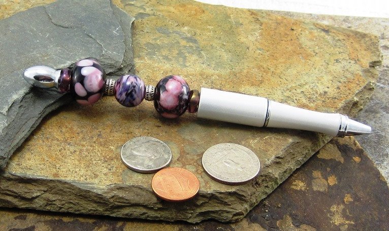 globalbrights1's tweet photo. Pearl White Designer Pen, Ivory & Purple Beaded Pen with Lamp Work Gla⦠https://t.co/I4ICXcoiqI #Etsy #RefillablePen https://t.co/4bNUXRujeF