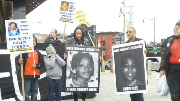 Harold_Jessen's tweet photo. From Barclay's Center rally marking one year since the police murder of 12-year-old #TamirRice. #YearWithoutTamir https://t.co/Fb5XxPm8WO