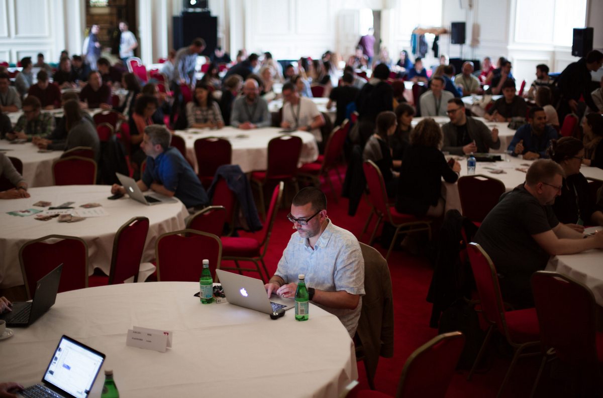rebaseconf's tweet photo. Love this shot of @fehler working on his slides just before his talk.

https://t.co/pSIA0C7gsN https://t.co/oRomSG38GQ