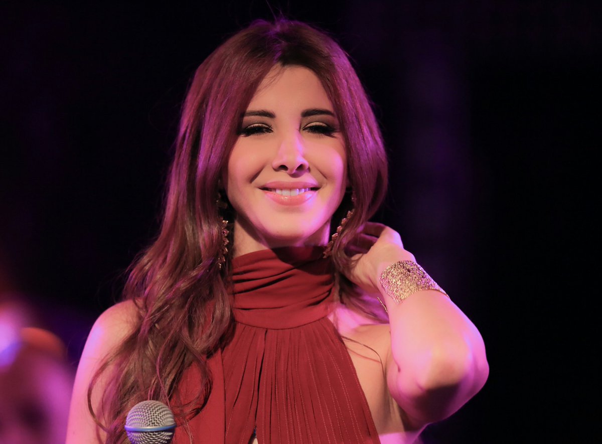 NancyAjram's tweet photo. Smile... #morocco #mazagan #concert nancyajramgoestomorocco https://t.co/EbaUaRwJ1t