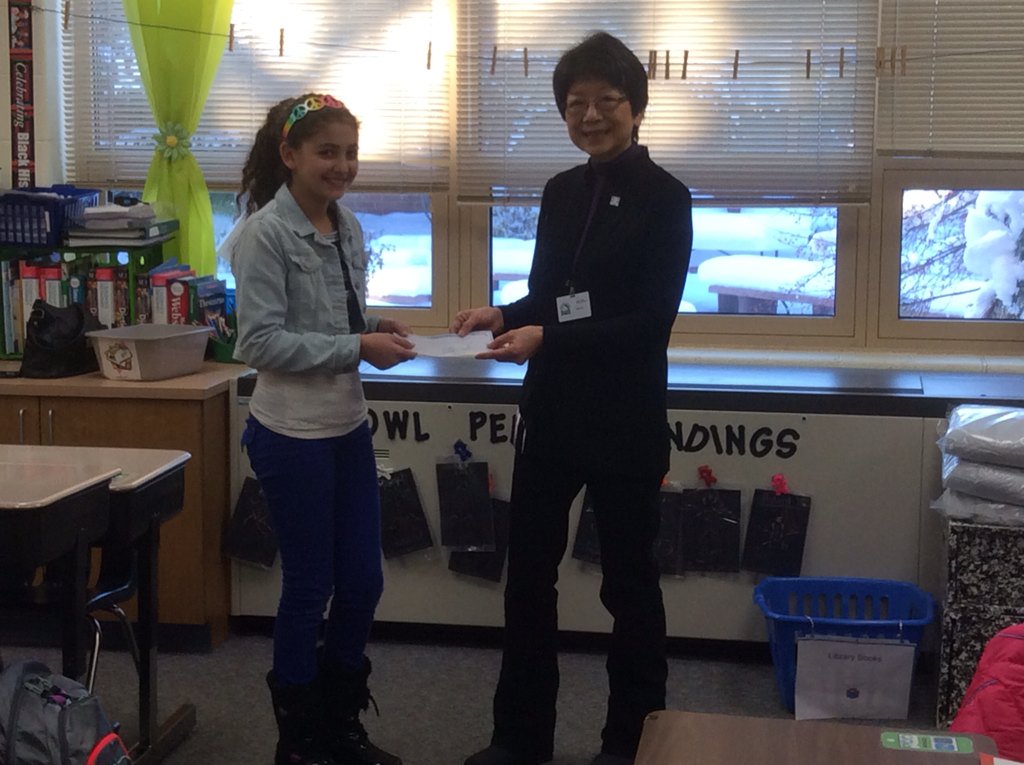 ljkolasinski's tweet photo. Student council members present a check and a present to Myra Snyder from Bear necessities @GlacierRidgeD47 https://t.co/mItoF63TLN