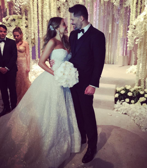 VogueFrance's tweet photo. .@SofiaVergara​ looked sensational in her custom @ZMURADofficial​ #weddingdress: https://t.co/O14pocbsvx https://t.co/Z2ofXEUhY7