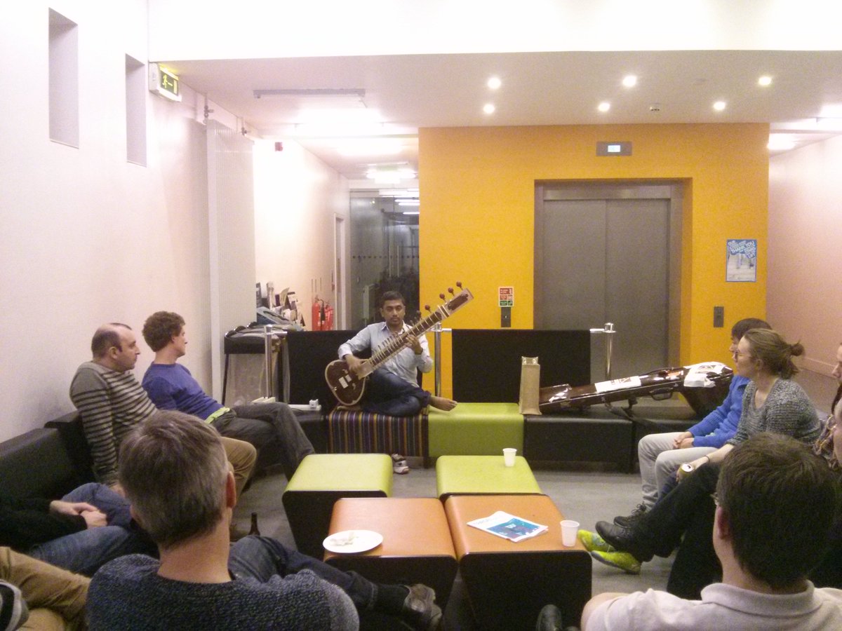QUBMathsPhys's tweet photo. #CTAMOP held a pizza night on Tuesday, including sitar music provided by our own Dr Laha! https://t.co/2DxBVbfaLz