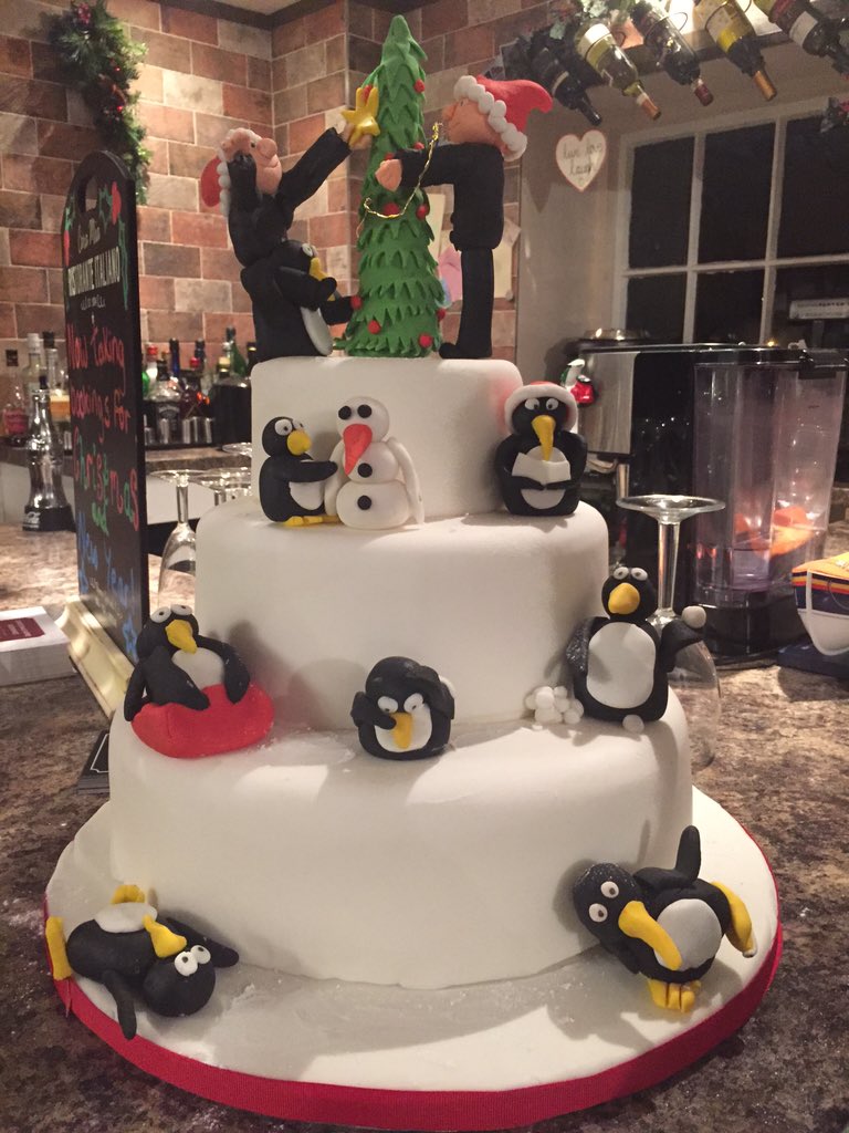 TLRKitchen's tweet image. Christmas cake. Penguins playing the the snow #Christmas