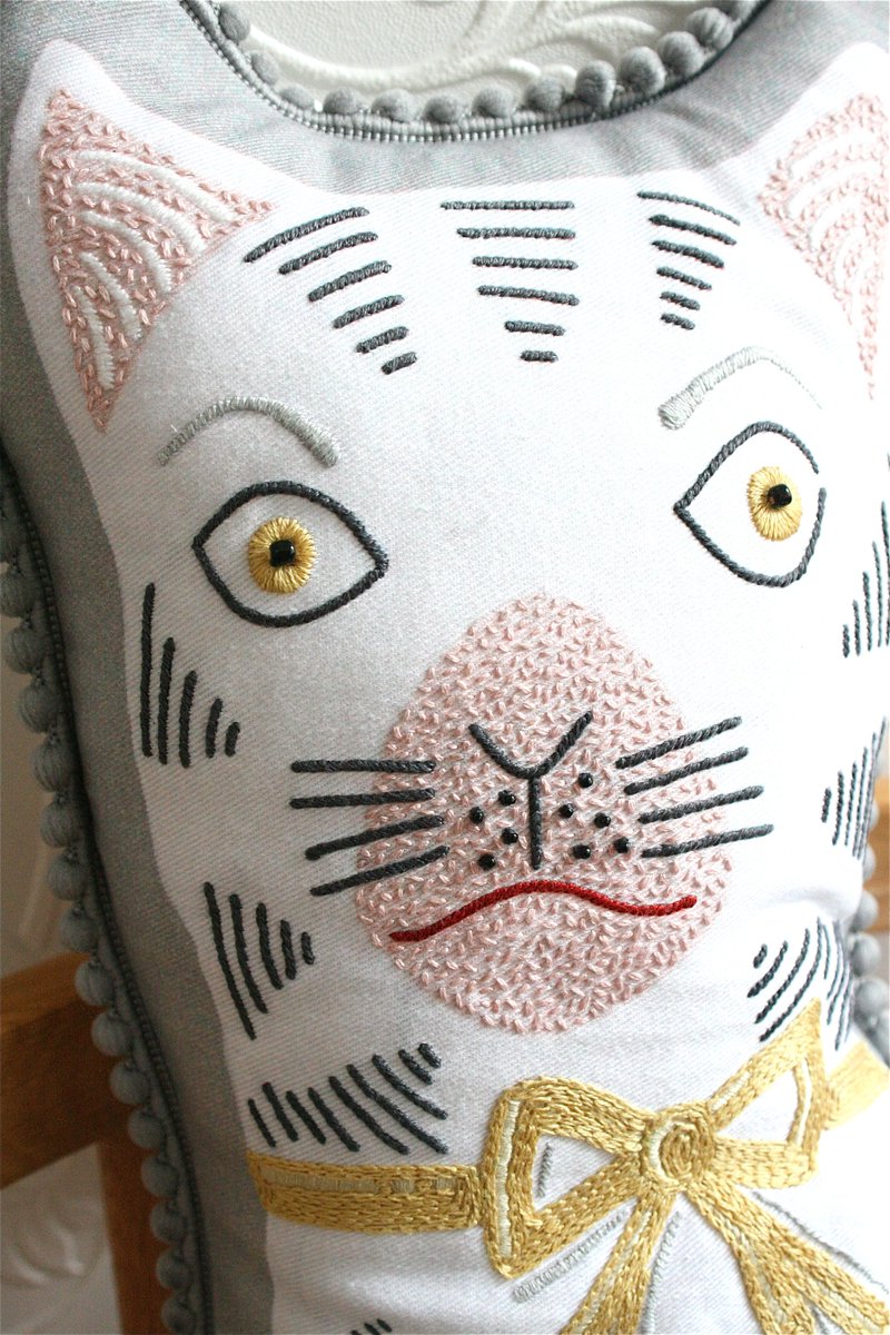 AnnsOrchard's tweet photo. Packing for Knitting &amp; Stitching, Harrogate. This embroidered chap is coming along for the ride #cat @twistedthread https://t.co/OOXL6yPbNj