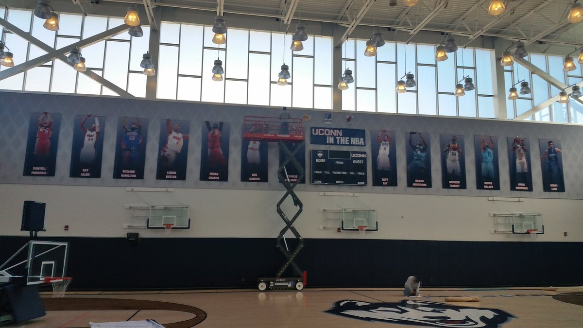 UConnTrademark's tweet photo. NBA Lottery pick banners going up in @UConnMBB Werth Family Ctr today. Some pretty good players... https://t.co/SBBDZDEtXc