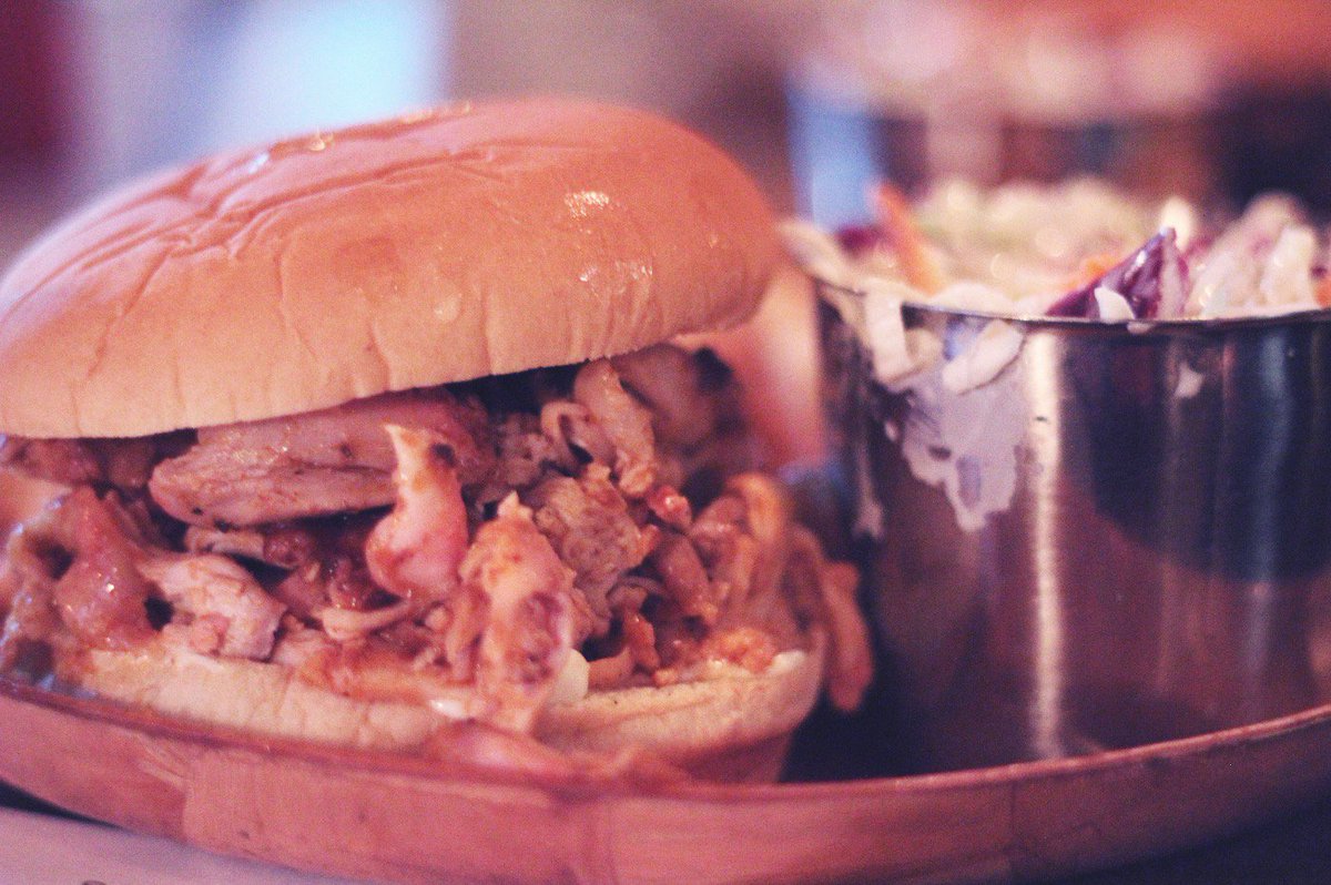 wenonalodge's tweet photo. Have a giant sandwich stacked with pulled pork this fine Tuesday. #thingsyoushoulddo #craftbeer #bbq @porkninjason https://t.co/8z478vPbmk