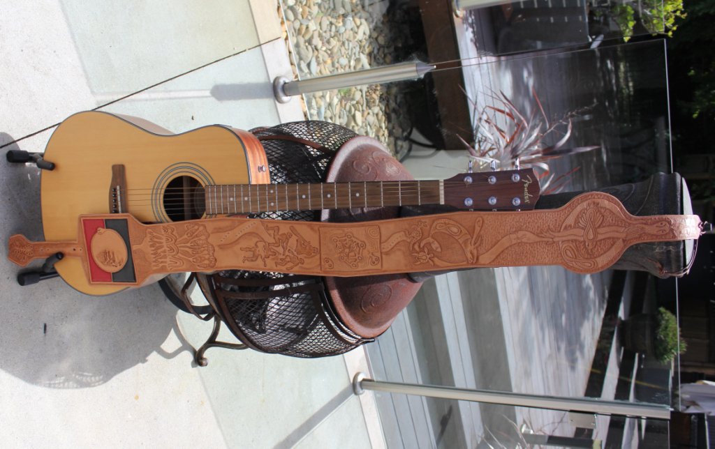 leatherartz's tweet image. @guitarsample Hi, I create hand-carved leather guitar straps and band art. Interested in sharing? #leatherartz