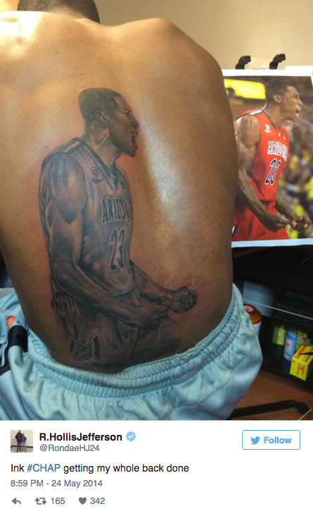Yahoo's tweet photo. Nets rookie gets a tattoo of himself on his back https://t.co/KjYUONbLxE https://t.co/C3r7VfUYEU