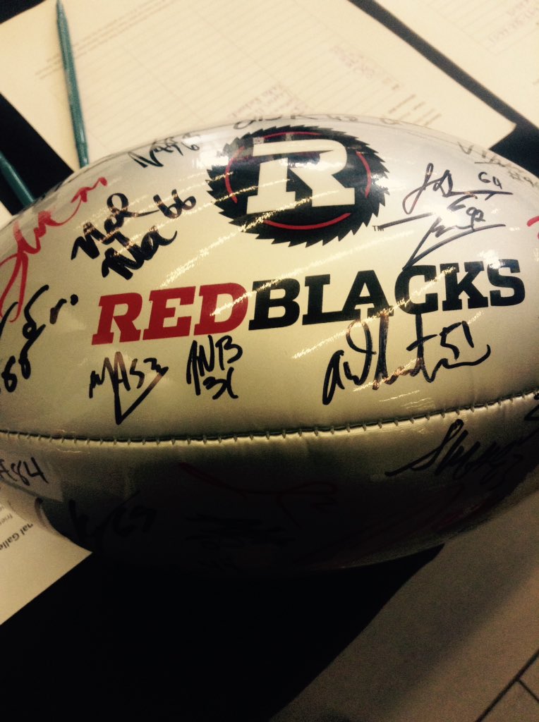 SLRavens's tweet image. Gift someone with a @REDBLACKS signed football at the #CarletonASB silent auction before their Grey Cup showdown!