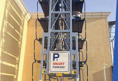KieranWhite93's tweet photo. First of #Qatar's 'smart parking' looks like a car vending machine! #construction 
https://t.co/XCFxhJ6lBF https://t.co/sRZTkBgq95