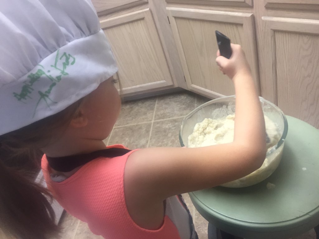 Wearing her <a href="/amandafreitag/">Amanda Freitag</a> signed chef hat while she makes mashed potatoes for #Thanksgiving