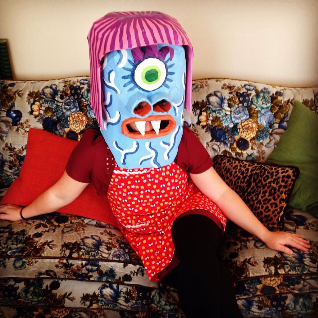 Skuttlesworth's tweet photo. Mrs. Skuttlesworth is taking a break from Thanksgiving cooking.  #mrskuttlesworth #monster #costume #papermache https://t.co/b6ln8RlLPd