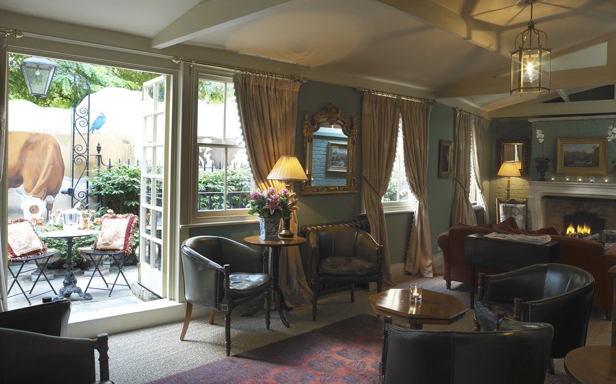 The conservatory has a working fireplace and an honesty bar where you can relax rookeryhotel.com/service/ #TheRookery