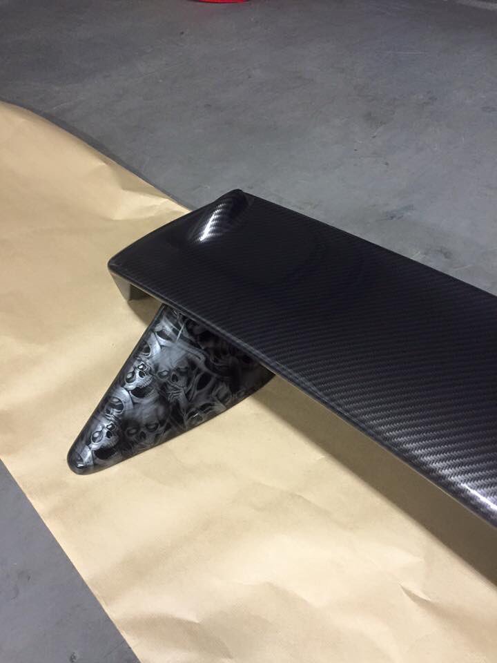 WsHydrographics's tweet image. Spoiler done in carbon effect,up stands double dipped brushed metal with skulls over the top.