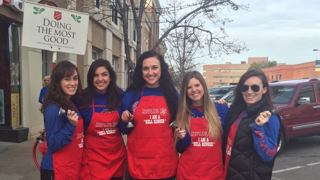 KUSoftball's tweet photo. Helping out the Salvation Army on stop day! #KUsoftball https://t.co/EIFQdVsUHg