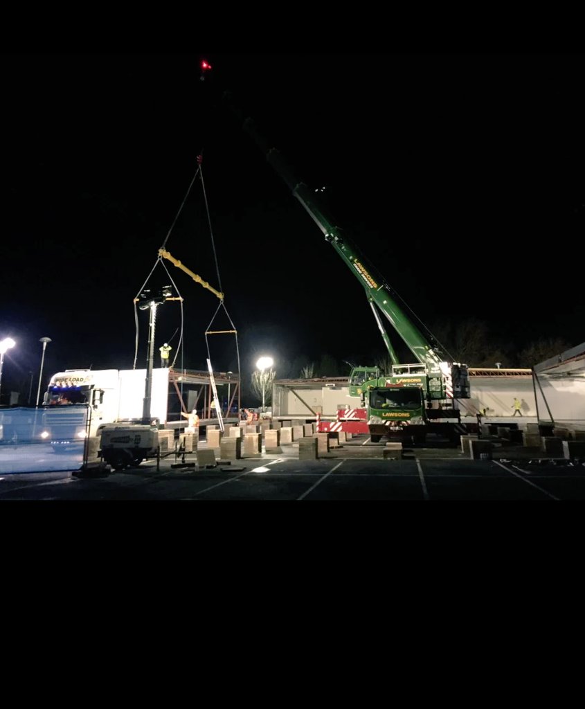 The team working hard building the temporary #TescoCarlisle store overnight and this weekend. #CumbriaFloods