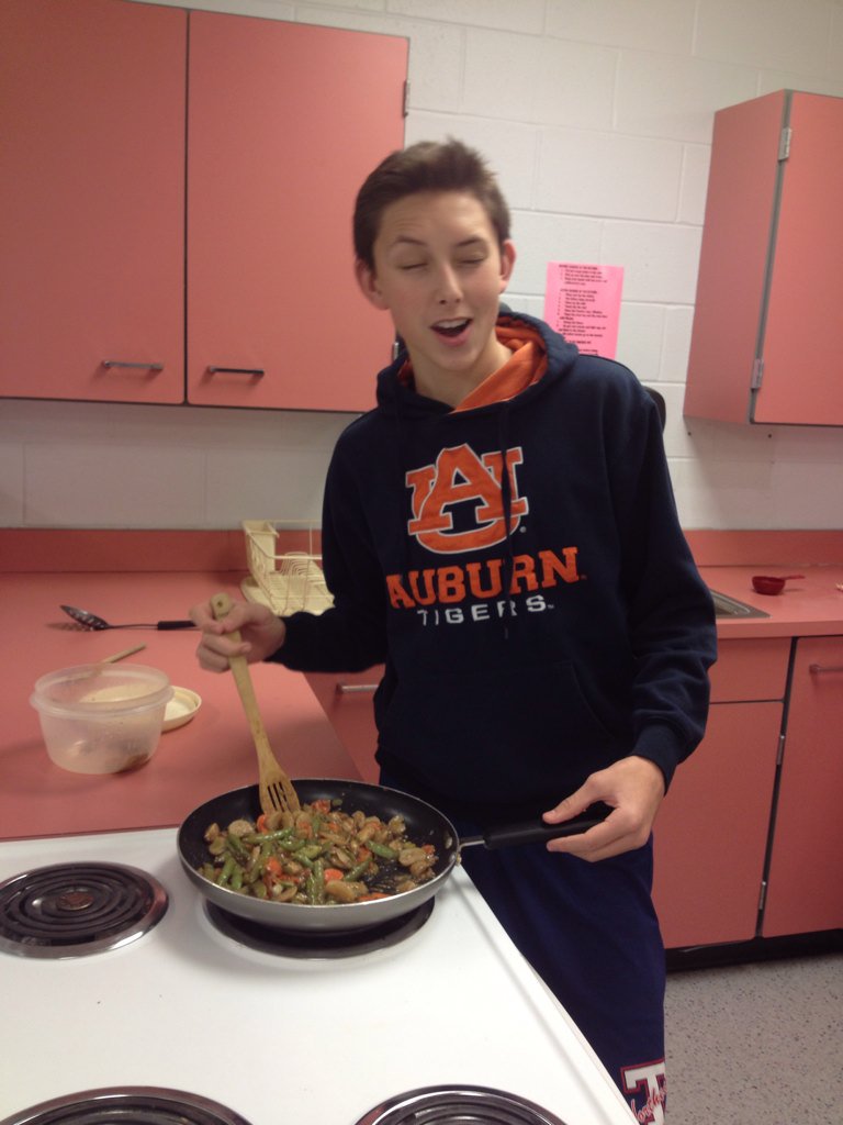 MrBlantonLMS's tweet photo. Thanks for inviting me to the FACS stir-fry, students! Garrett with the no look stir-fry move. Show off. #WarEagle https://t.co/VYm4lDEaAd