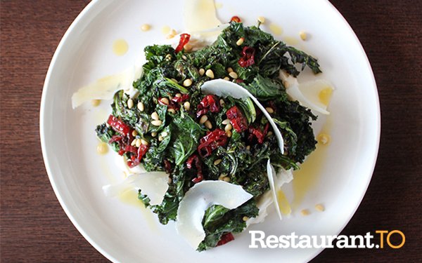 Grilled Kale Salad with Fried Chillies, Parmigiano, and Pine Nuts at Queen Margherita Pizza restaurant.to/queen_margheri…