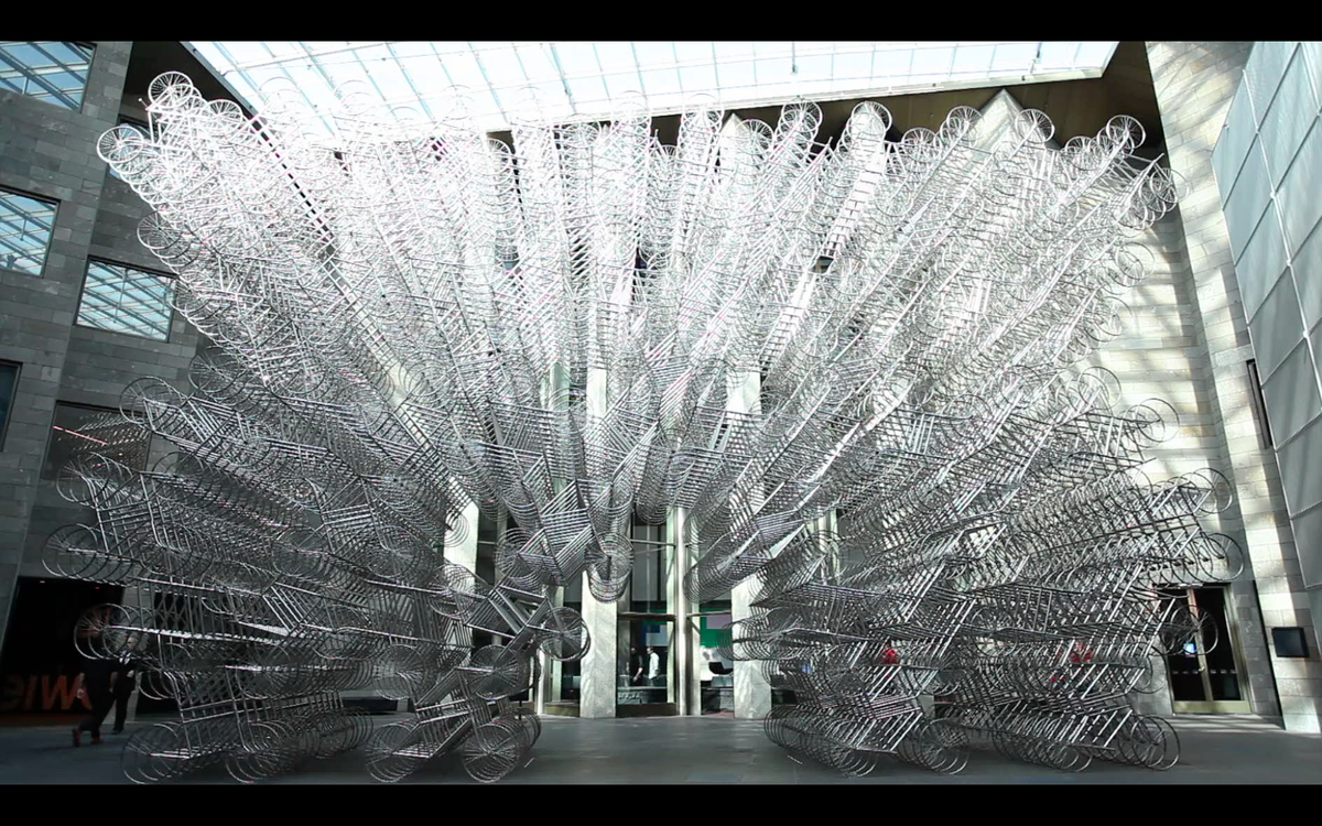 jondonnisonbbc's tweet photo. A better shot of the breathtaking Ai Wei Wei Forever Bicycles sculpture made of 1500 bikes at new show in Melbourne. https://t.co/Xg95UIyZVR