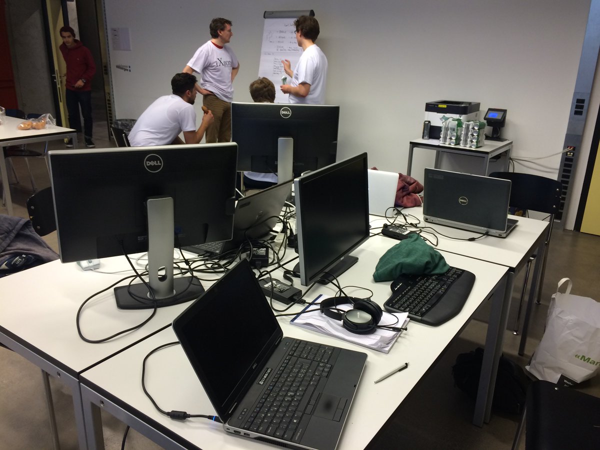 ICC_Lab's tweet photo. Team #iXport is working with a lot of screens here. #icclab_hack #hackathon @seanrmurphy @themerne https://t.co/1UEmsg1kcs