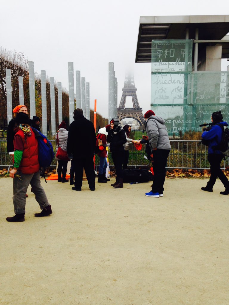 CJAOurPower's tweet photo. Prepping for the big action to #rejectfalsesolutions from U.S! Check it out @ peace wall! #ittakesroots #cop21 https://t.co/zMV0OKasHN