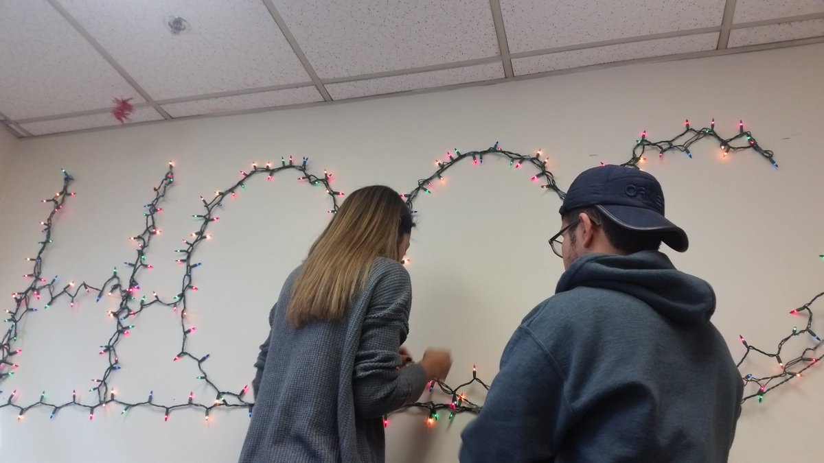 HCCCStudentGov's tweet image. #HCCCSGA Treasurer Nat and Senator Ibrahim decorating our office to show our #HCCC pride and our holiday spirit! 😄