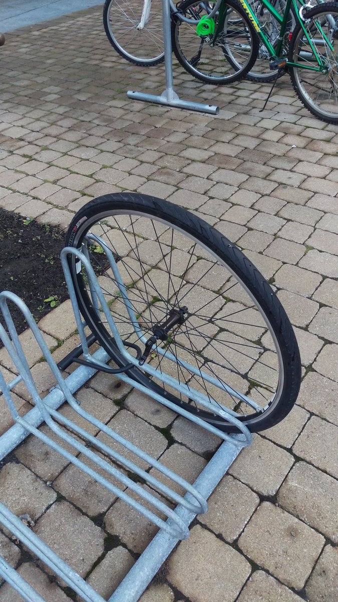 ottthisweek's tweet photo. This happens when you only lock your front, quick release, wheel. Lock the frame! #Ottawacycle https://t.co/6didisKUQF