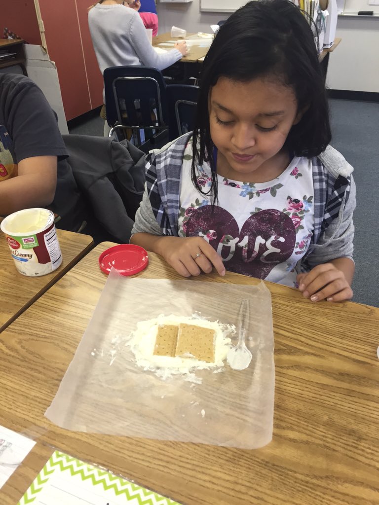 Ms_Welsh1's tweet photo. Modeling the movement of tectonic plates! (And eating them too!) #TopographicChanges #ScienceIsFun #BRCPride https://t.co/1g6Zqyh4p4
