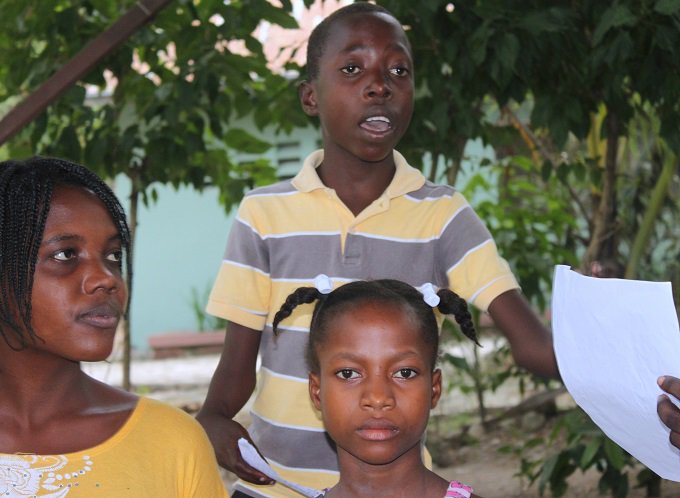 UNICEFHaiti's tweet photo. Bency writes on women’s rights. Read his poem https://t.co/skSAplv4aa @UNICEF #16DaysofActivism  #HumanRightsDay https://t.co/jTTaoV82Dm
