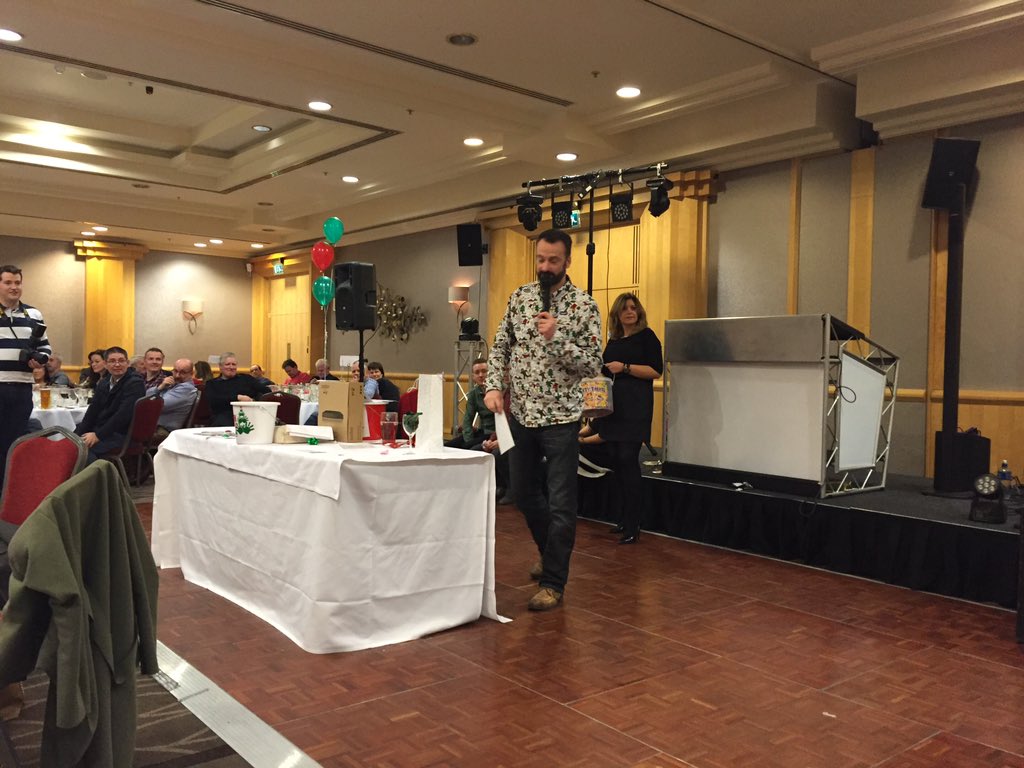 flax354's tweet photo. #bfsec Raffle prize time at the GDC Christmas lunch. https://t.co/esLmx6nHXU