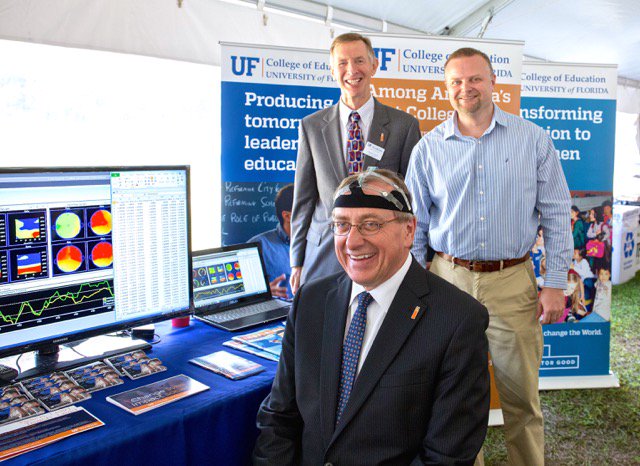 UF_COE's tweet photo. At last week's inaugural festivities, Dr. Kent Fuchs visited an exhibit on the use of EEGs in edu research. #UFPrez https://t.co/o6jEOMoFlz