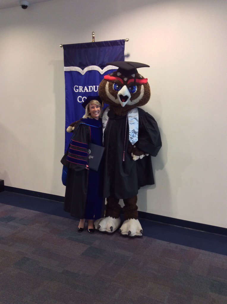 FAUGradCollege's tweet photo. @FAU_Owlsley Celebrating with Karen Pain #FAU15 https://t.co/oKlnP8QQ41