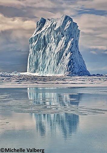 michellevalberg's tweet photo. To cool things down - a beautiful iceberg near the floe-edge close to Arctic Bay, Nunavut. @NikonCanada @NunavutRR https://t.co/TLAT0sRZXr