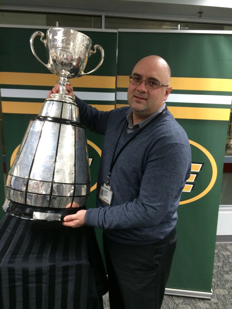 RobertValpy's tweet photo. Grey Cup paid a visit to the @PostmediaSales department today. #yeg #Esks https://t.co/VPPCKVsiZe
