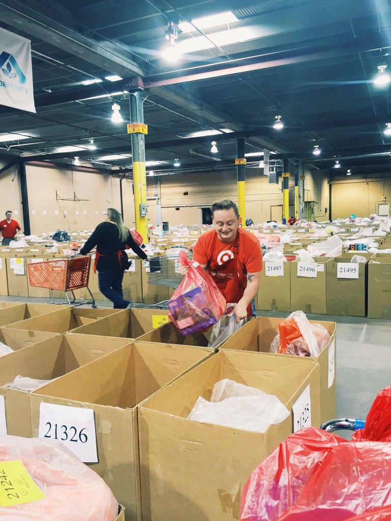 Sorting presents! All those boxes represent all the families whom the Salvation Army is able to provide toys for!