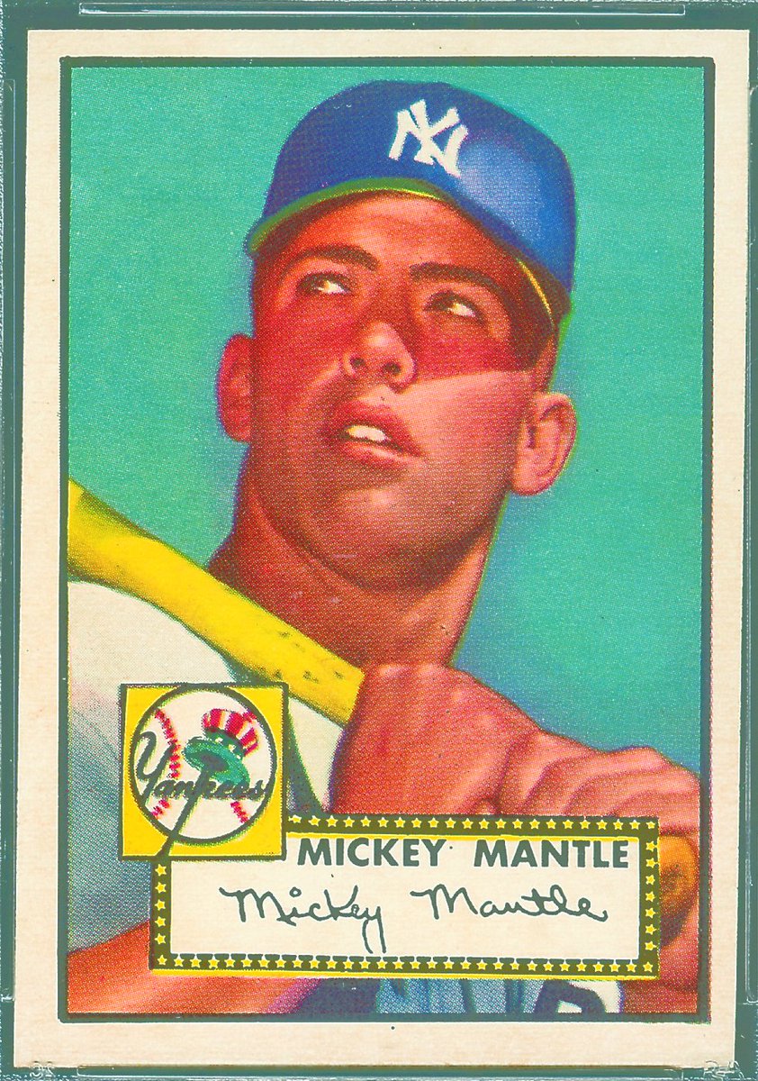A rare topps 1952 mickey mantle rookie card has sold at auction for