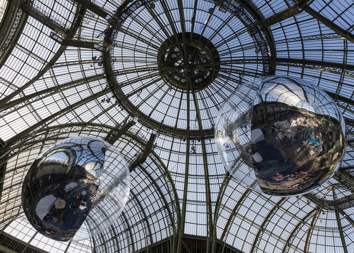 dezeen's tweet photo. Installation of air-filled globes designed to sail across the sky: https://t.co/PaAm3moqk1 https://t.co/G0HARe7XWd
