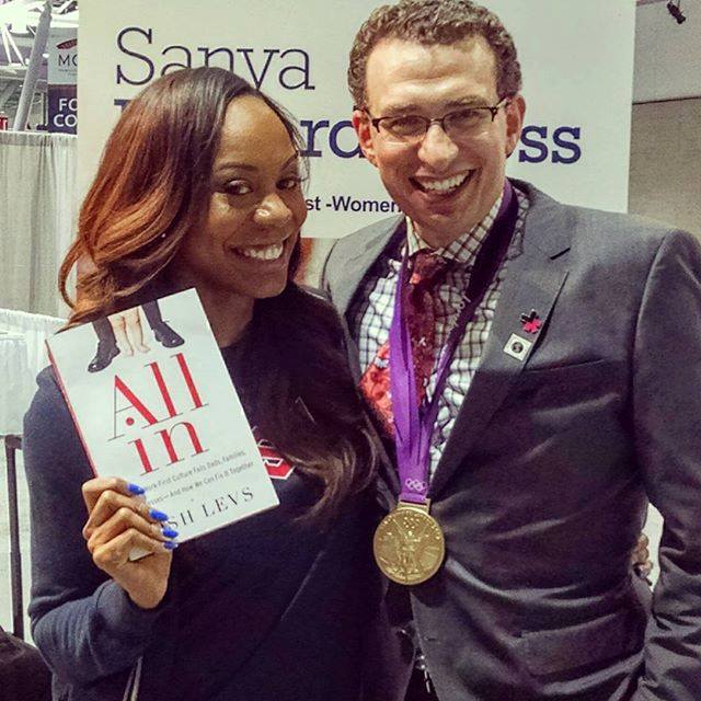 JoshLevs's tweet photo. Her book & 1 of my gold medals - no, wait. W/ @SanyaRichiRoss at #masswomen @LibertyMutual booth. #AllInBook :) https://t.co/6noDFnbwEv