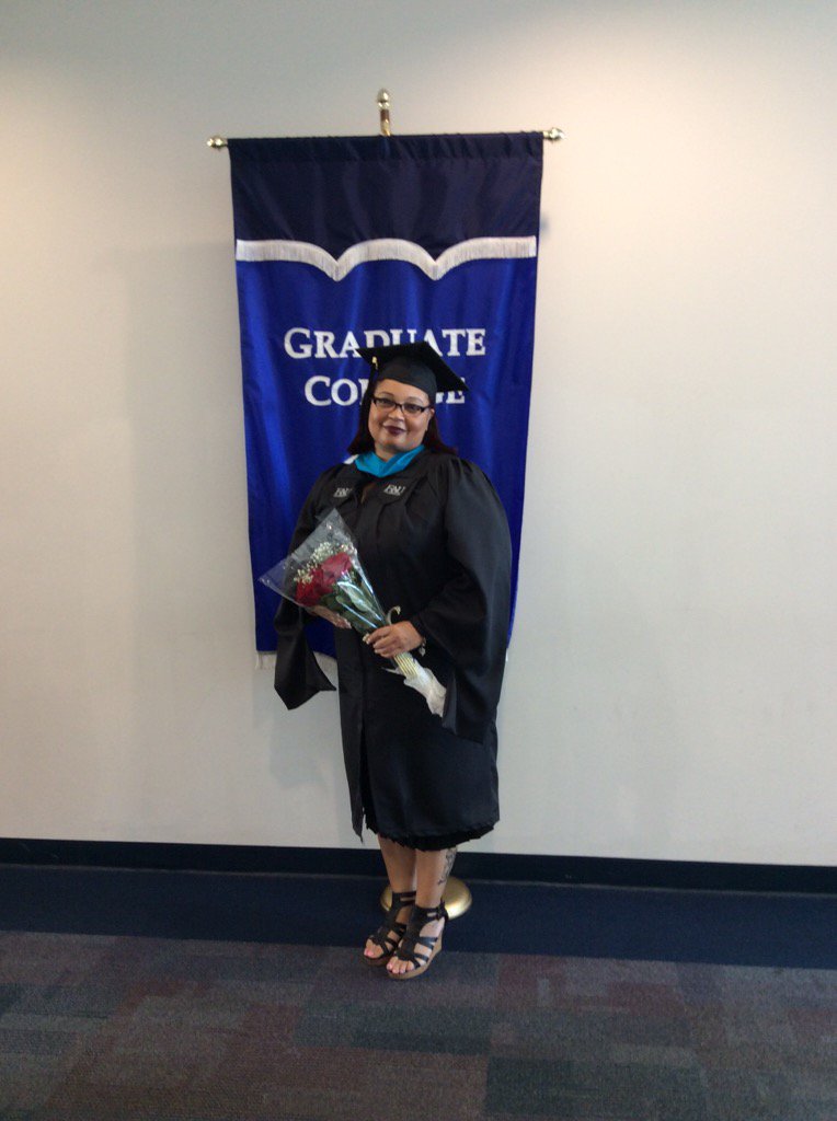 FAUGradCollege's tweet photo. @FAUGradCollege: Aiyeesha Candelaria just received her Masters of Public Administration-way to go! 🎓🎉 #FAU #FAU15 https://t.co/0DBwwwh62Q
