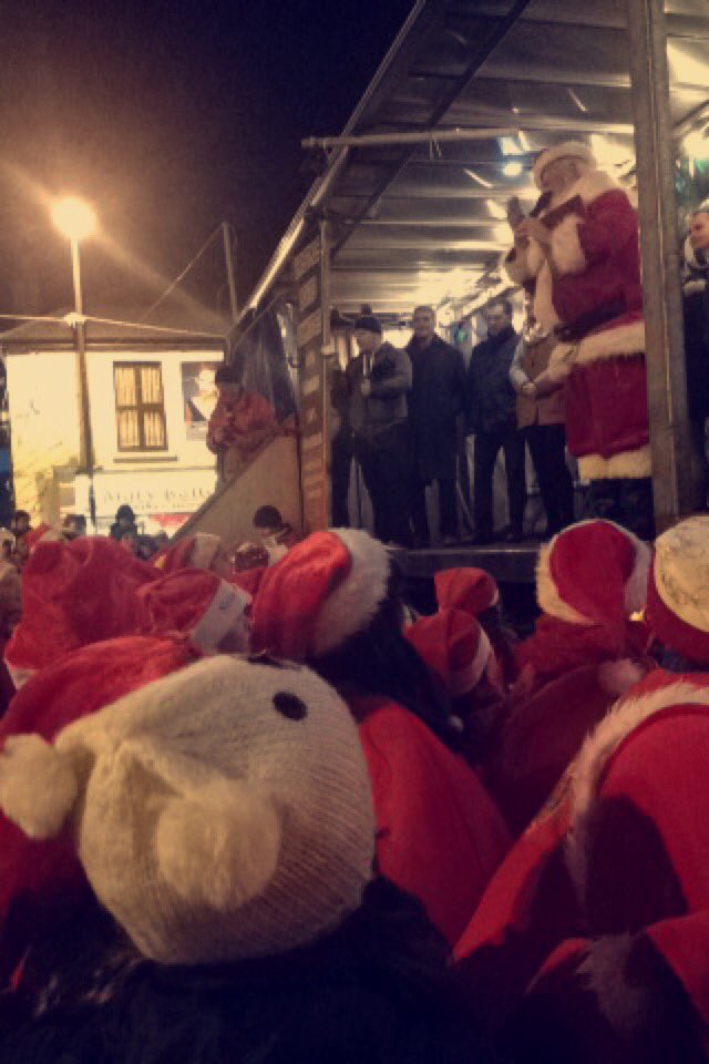 ScoilMhuireRos's tweet photo. They got to see Santa up close and personal,and sang with him as he turned on the lights🎄 @ChamberRos #singwithSanta https://t.co/D1U1uNQubM