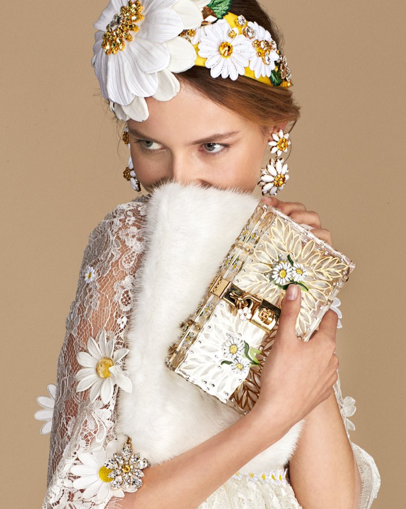 dolcegabbana's tweet photo. The daisy, flower of simplicity becomes glamorous and precious. 
#DGwomen #DolceGabbana #dgss16 https://t.co/j3VEgGZ4GA
