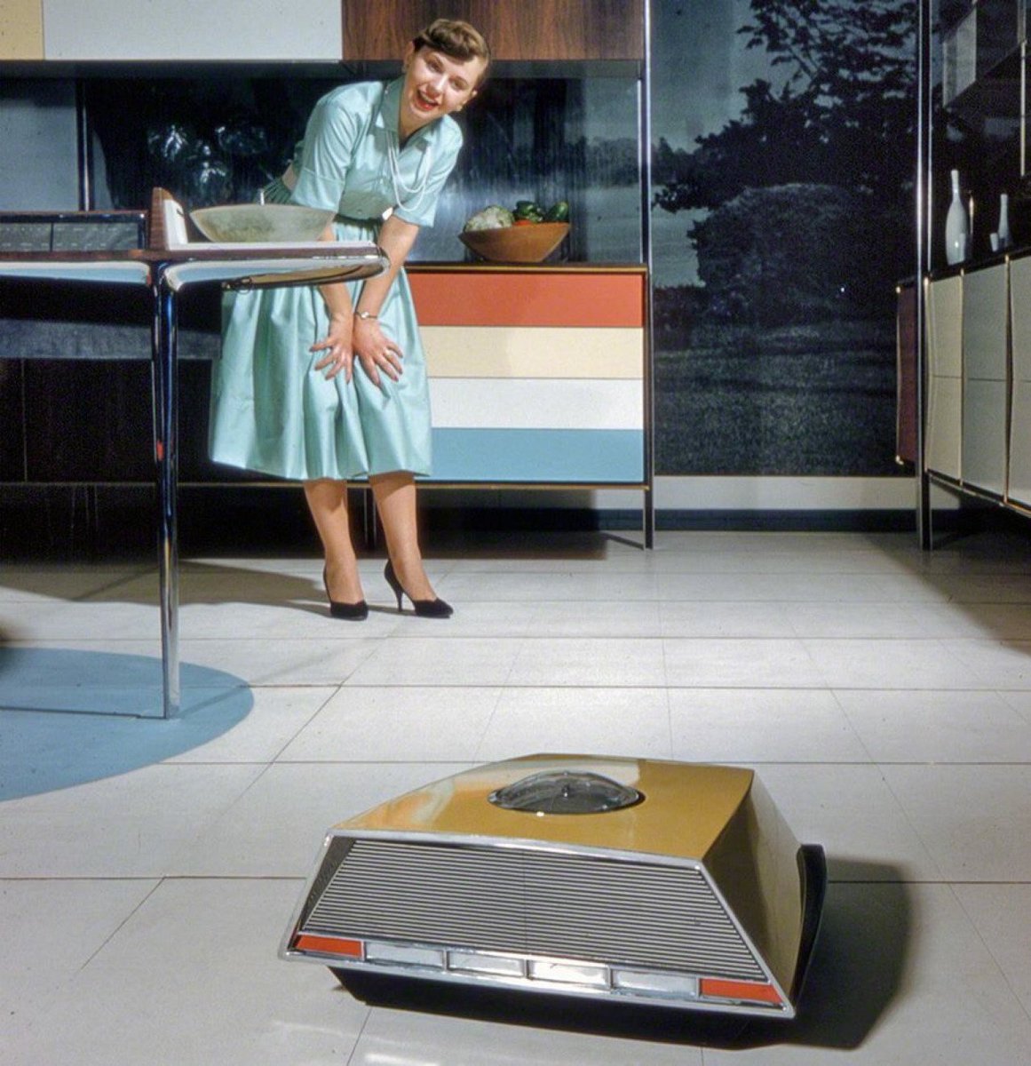 HistoryInPics's tweet photo. Robo-vac. From a "Miracle Kitchen of the Future" display at the American National Exhibition in Moscow, 1959. https://t.co/UzF1fi9yBF
