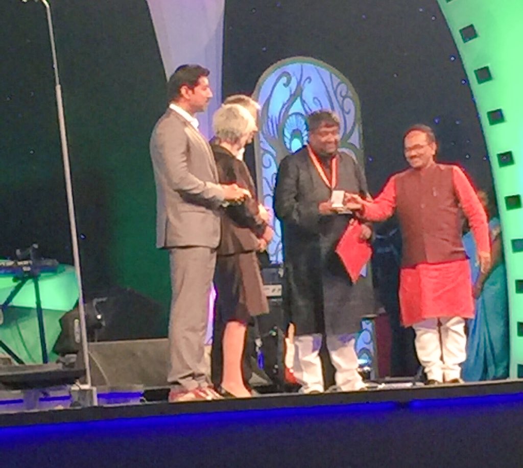 SVFsocial's tweet photo. Exclusive glimpses from #IFFI2015 of @KGunedited winning the ICFT-UNESCO Award,Fellini medal for #Cinemawala . 👍 https://t.co/rnDSQJ4RPg