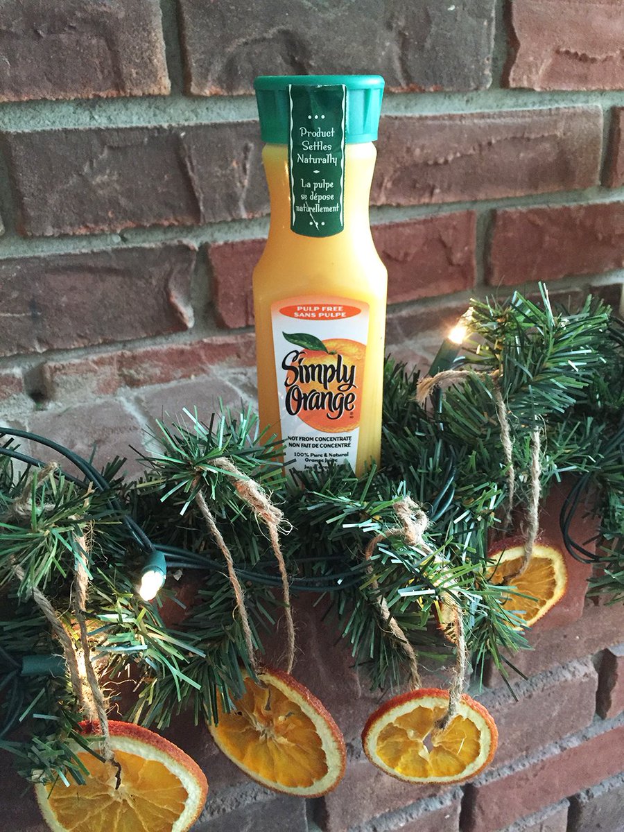 Dried orange slices + twine = tree decorations that smell as good as #SimplyOrange tastes. #DIY