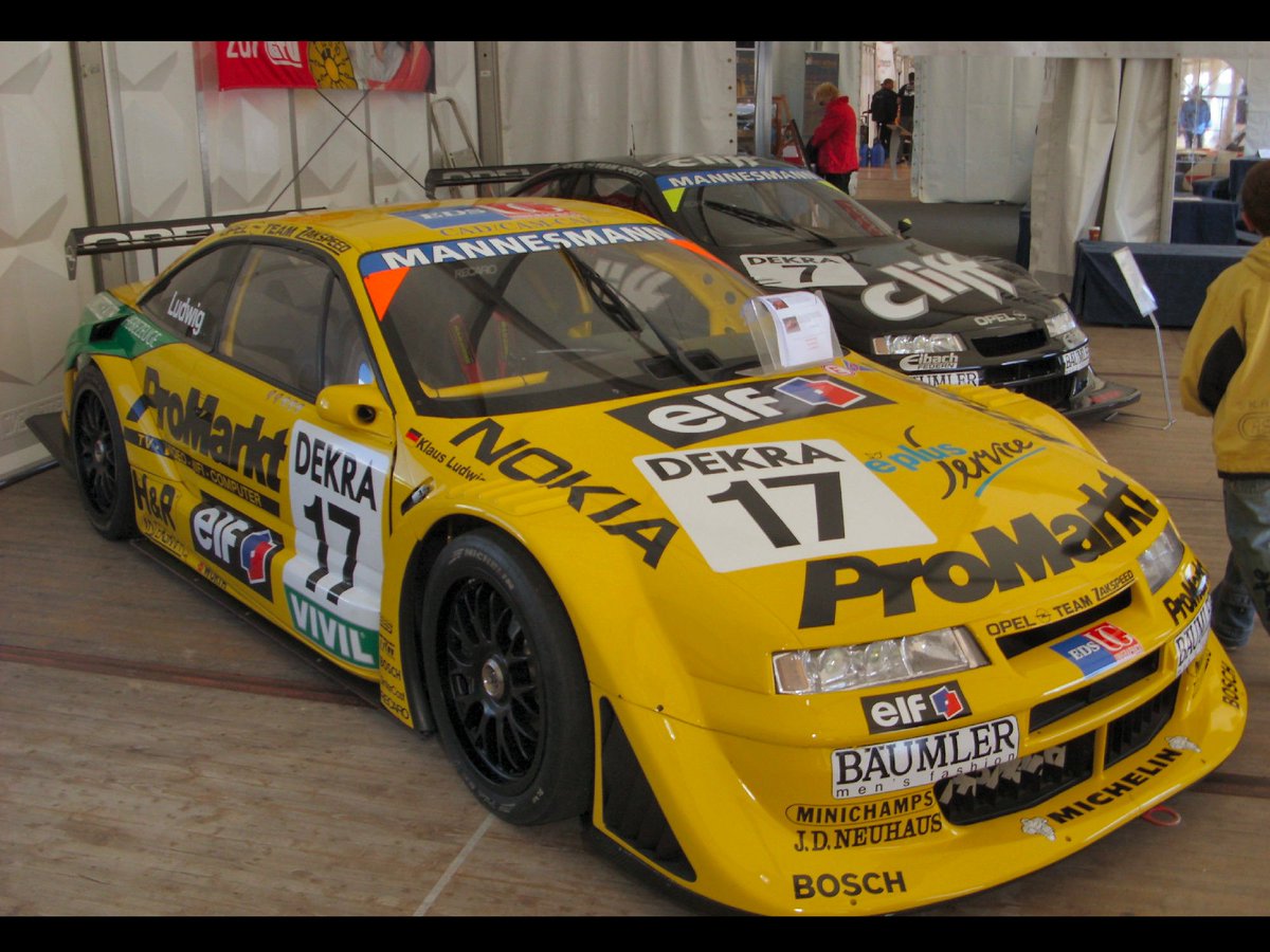 ITC1996's tweet photo. Klaus Ludwig & Manuel Reuter, both Opel Calibra, ITC 1996 #Cliff #elf #ProMarkt #Opel #TeamJoest #Zakspeed https://t.co/jGdook5ZEq